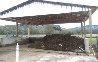 Manure storage building that allows cattle operation to store manure without runoff and apply when the pastures need it.